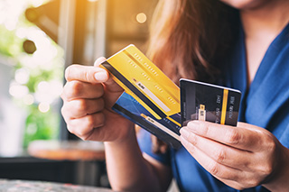 Woman holding credit cards