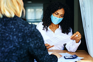 nurse helping woman