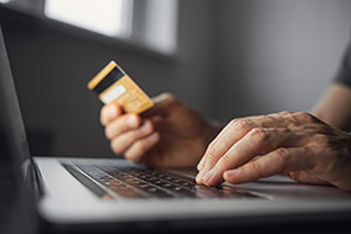 man holding credit card